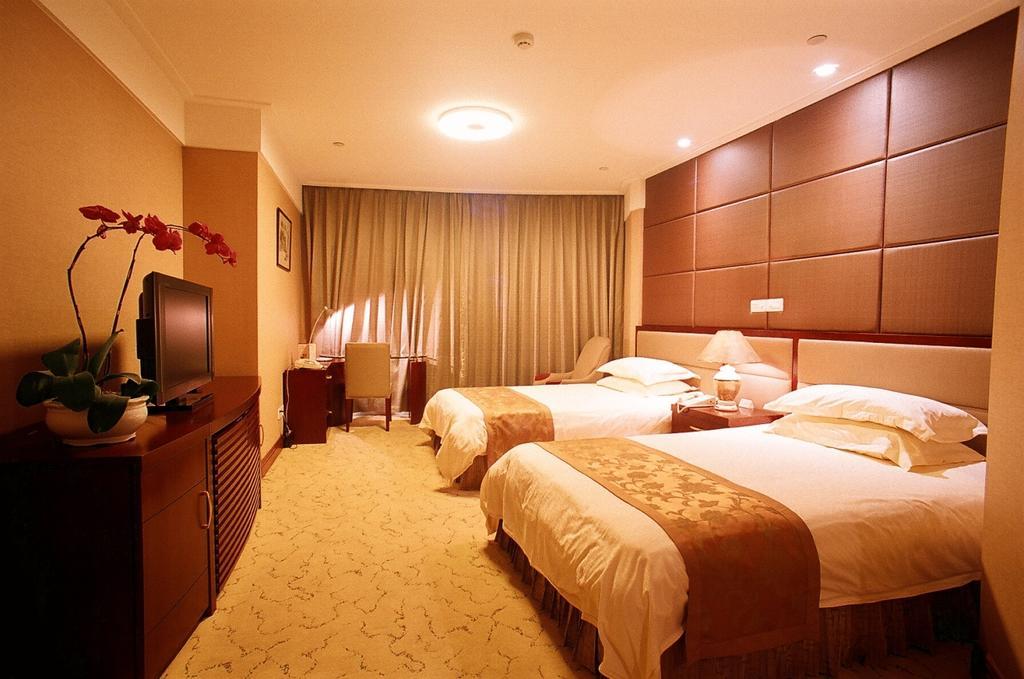 Shanghai Hengsheng Peninsula International Hotel Chambre photo